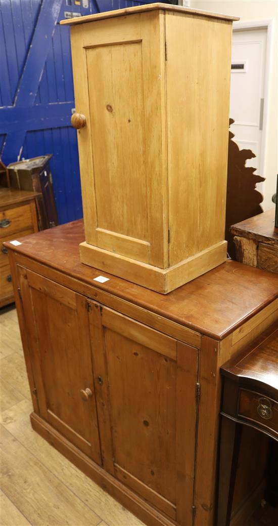 A pine two door cupboard and a pot cupboard W.102cm and 38cm